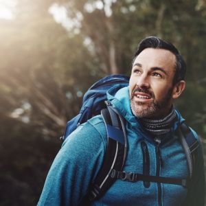 a man hikes, enjoying the flexibility of IOP in Denver, Colorado.