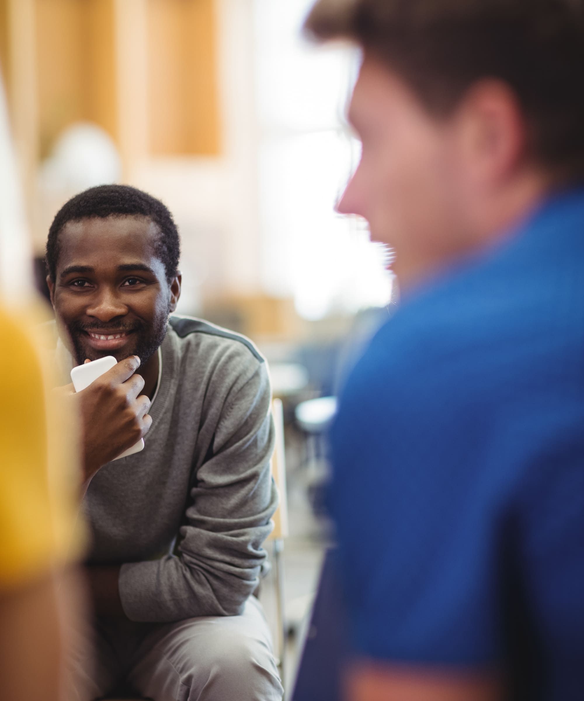 Group therapy session during sober living for men in Boulder, CO.