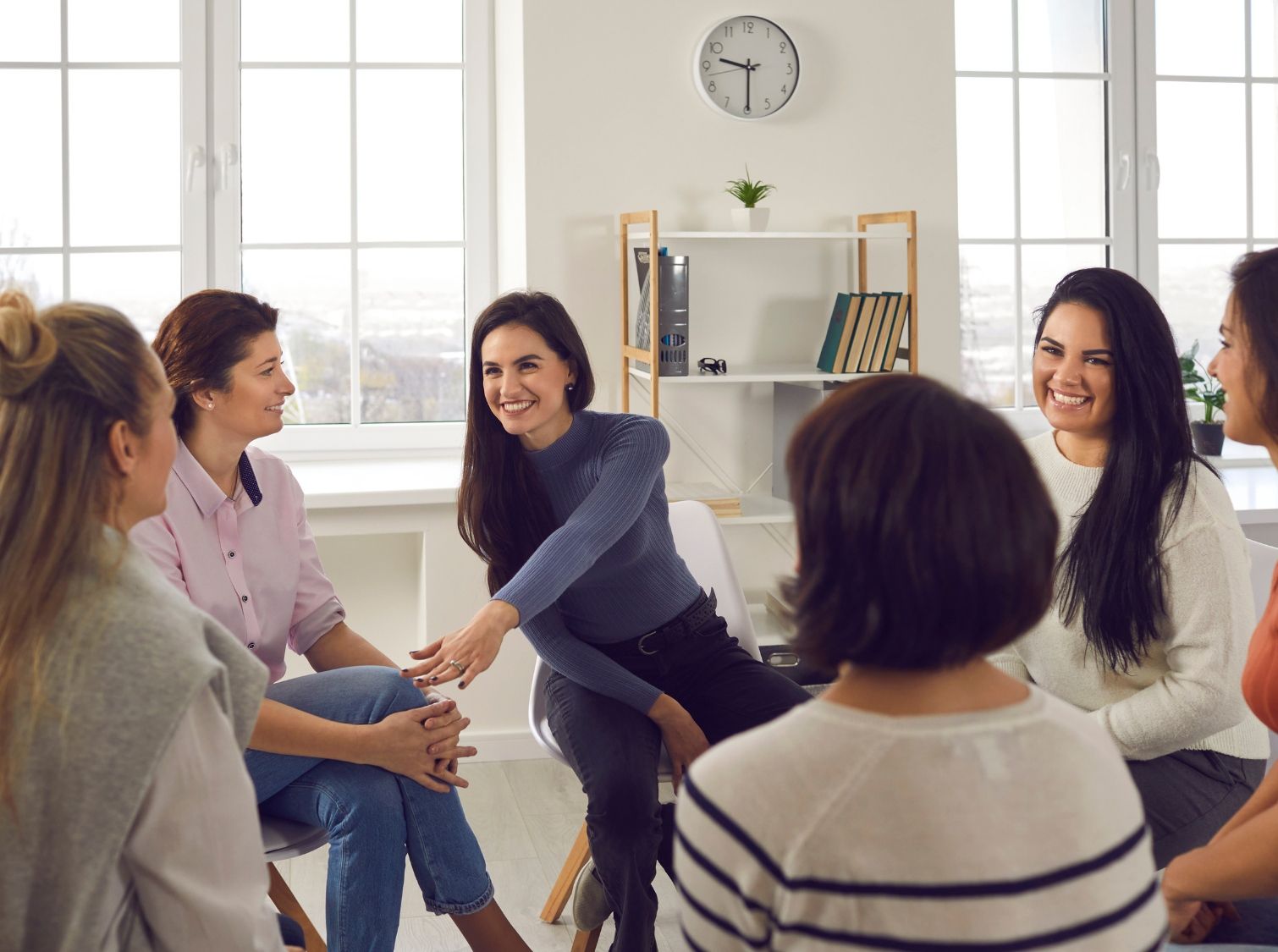 A man hugging a loved one during family therapy at a meth rehab.