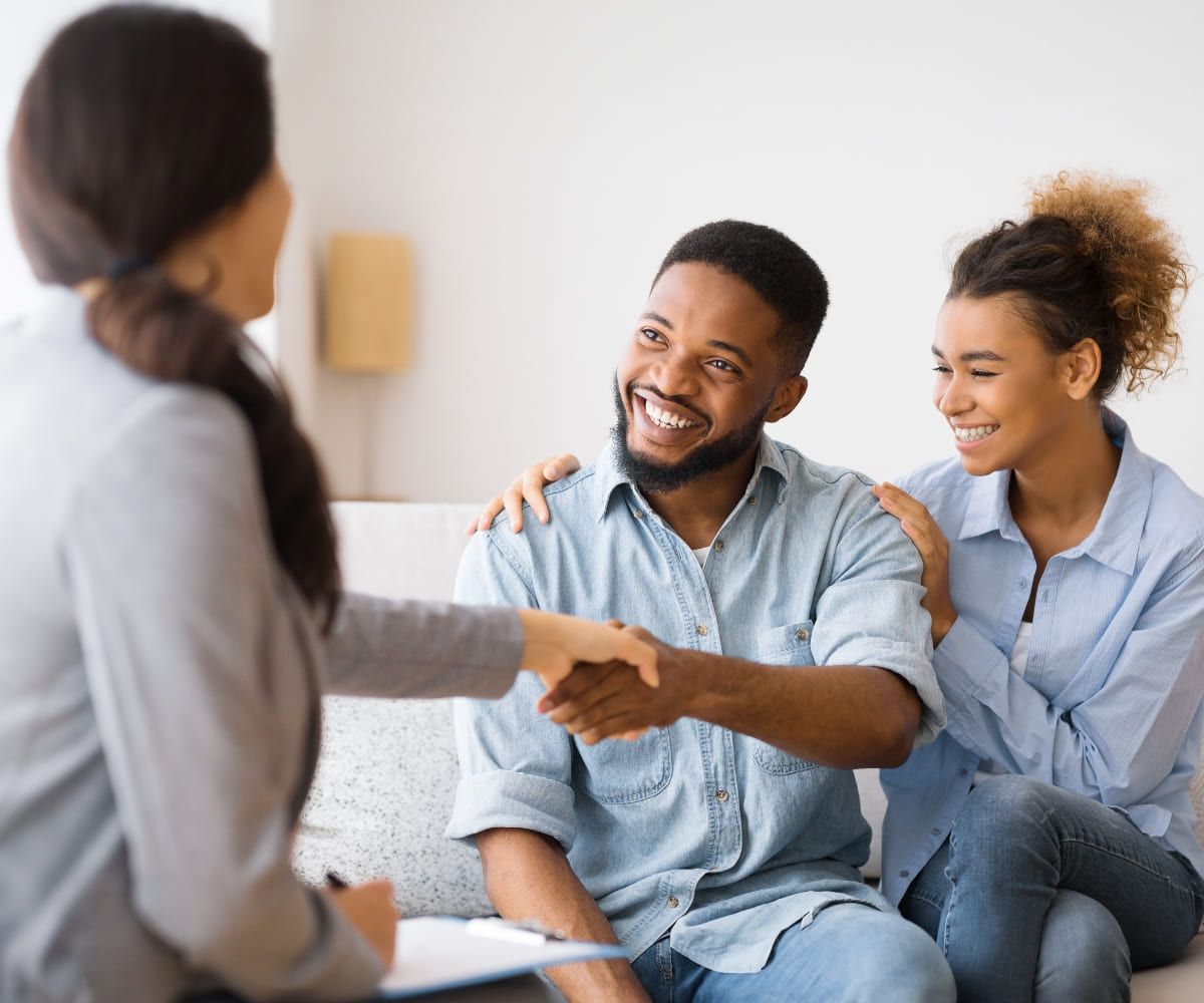 A man meets with his therapist as part of his Denver addiction recovery journey.