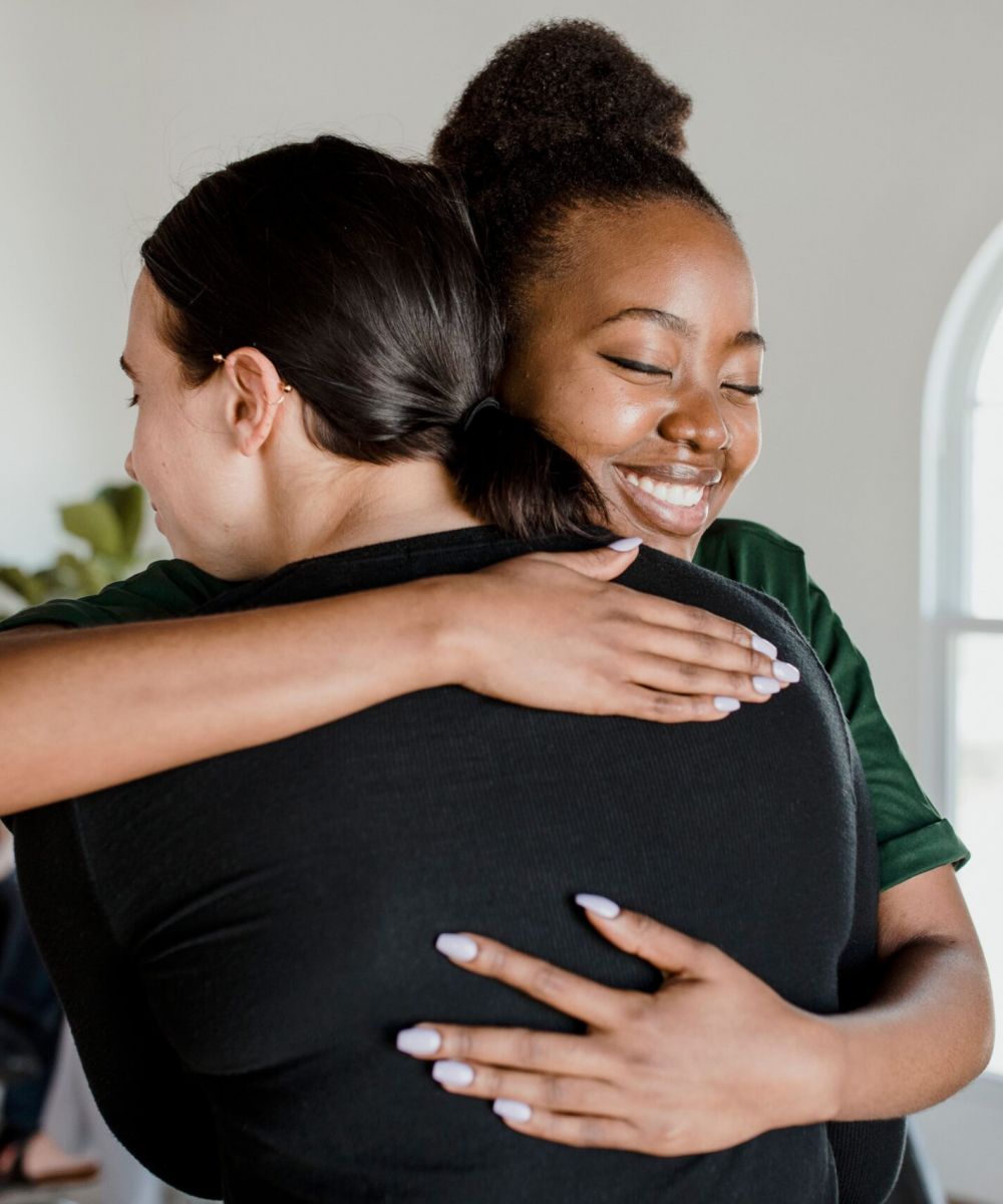 A woman shares her experience during a group session through Trauma treatment in Boulder, Colorado 