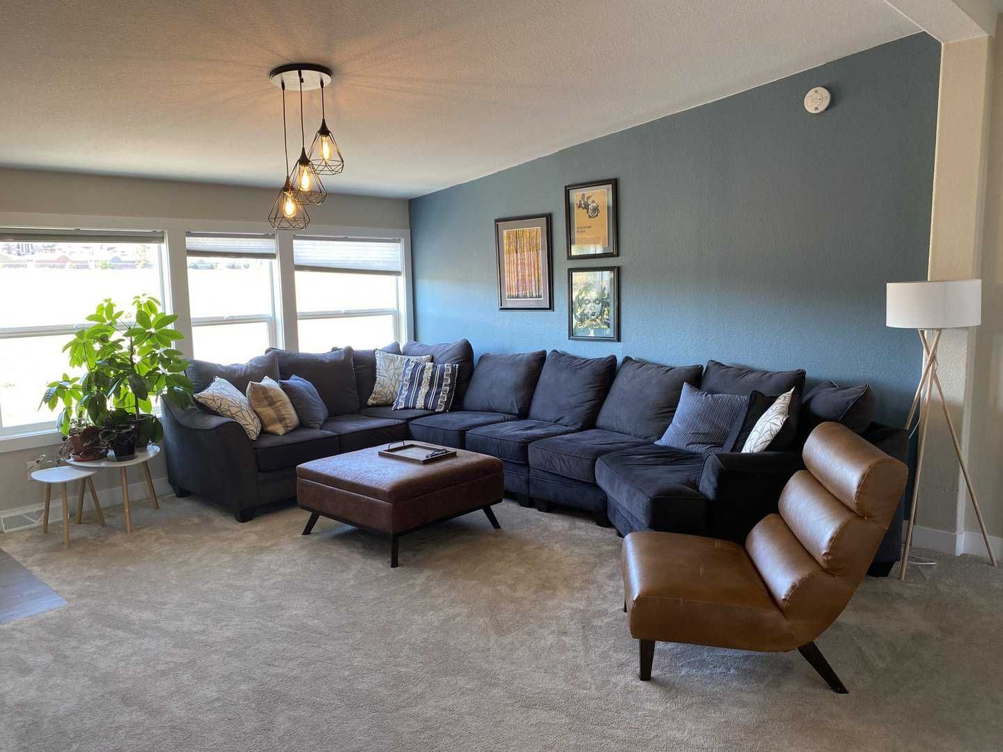 Living room with couch and chair at our drug rehab in Boulder, Colorado.