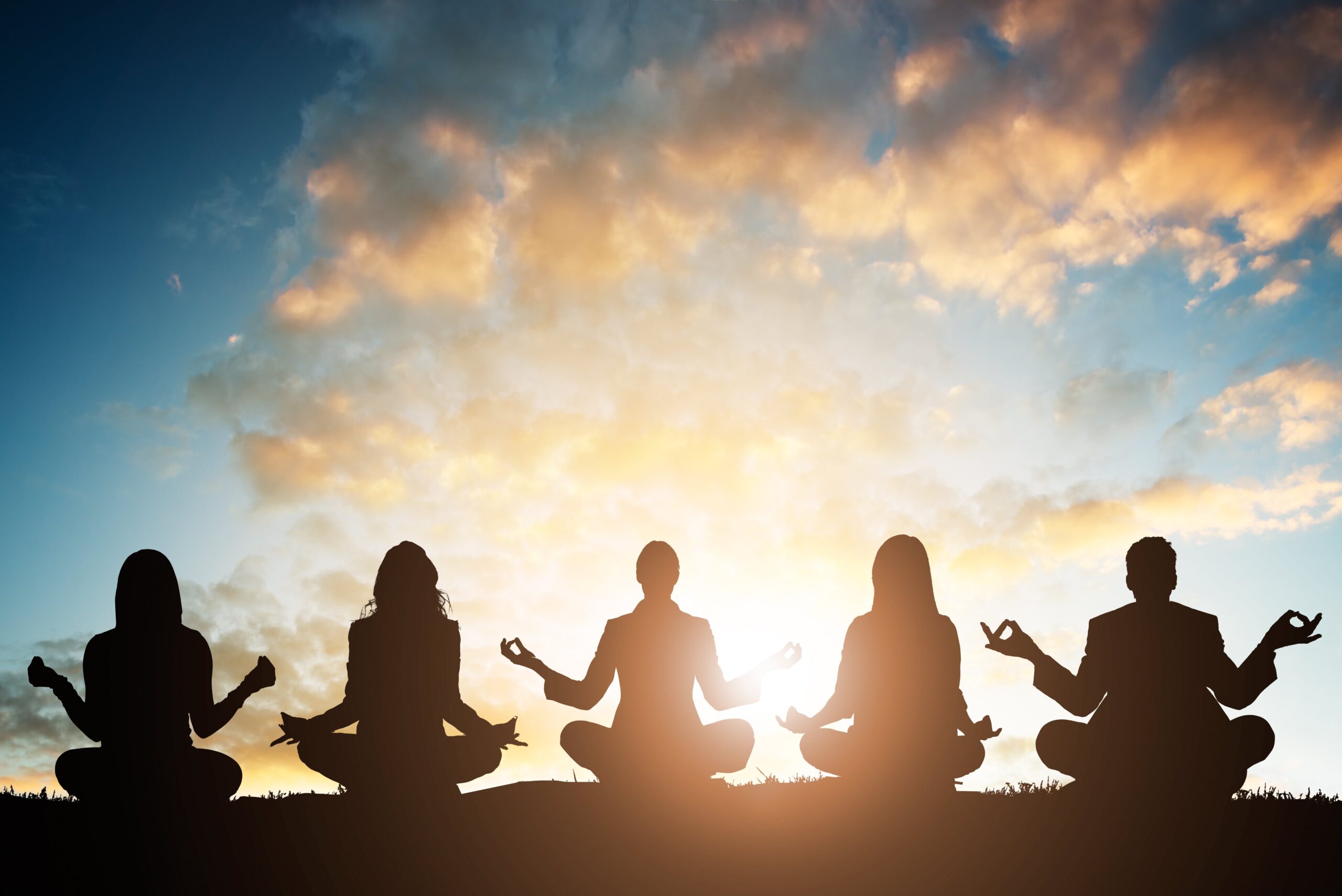 A group of people enjoying yoga during Longmont rehab.