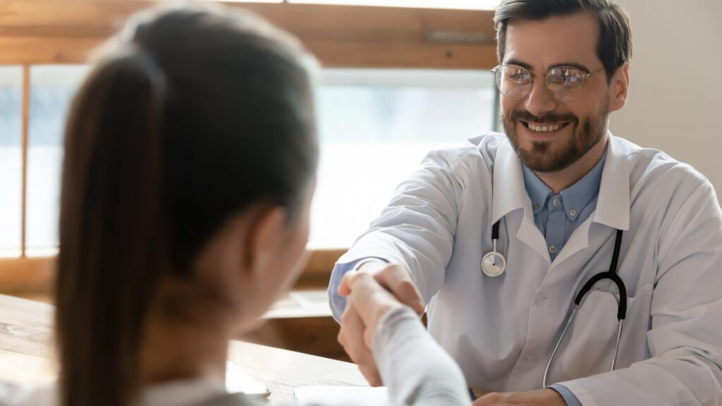 Doctor welcoming a patient into detox for benzo addiction treatment in Boulder.