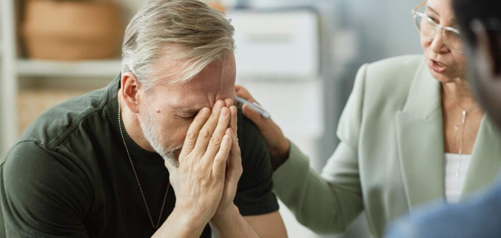 Man receiving guidance and support during cocaine addiction recovery in Boulder.