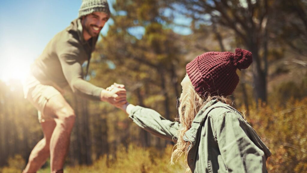 Man supporting a peer during holistic alcohol addiction treatment in Boulder, Colorado.
