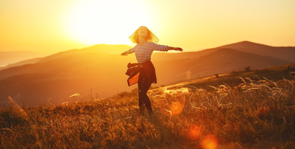 A woman enjoying life after holistic therapy in Boulder, CO