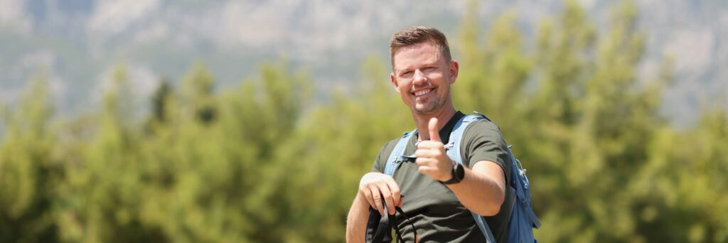 A man enjoys hiking as part experiential therapy during depression treatment in Boulder Colorado.