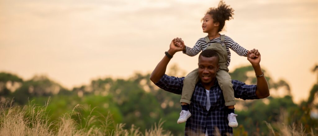 A father enjoys time with his daughter after completing depression treatment in Boulder Colorado.