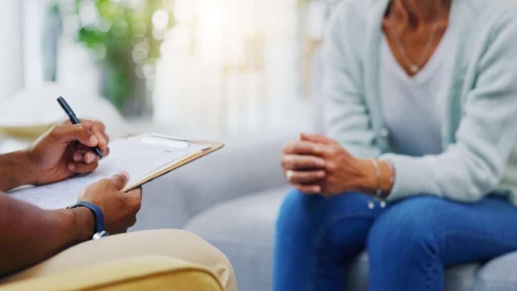 A woman discusses Humana rehab coverage in Colorado during recovery treatment.