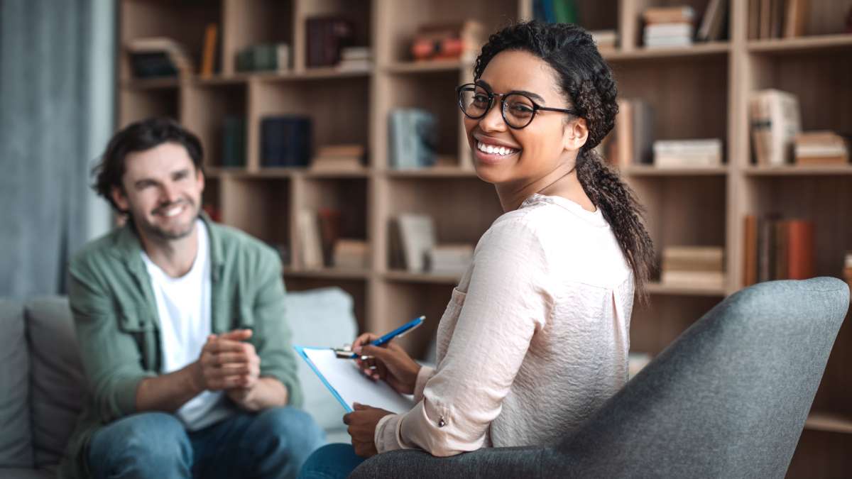 a therapist discusses Humana rehab coverage in Colorado with a client.