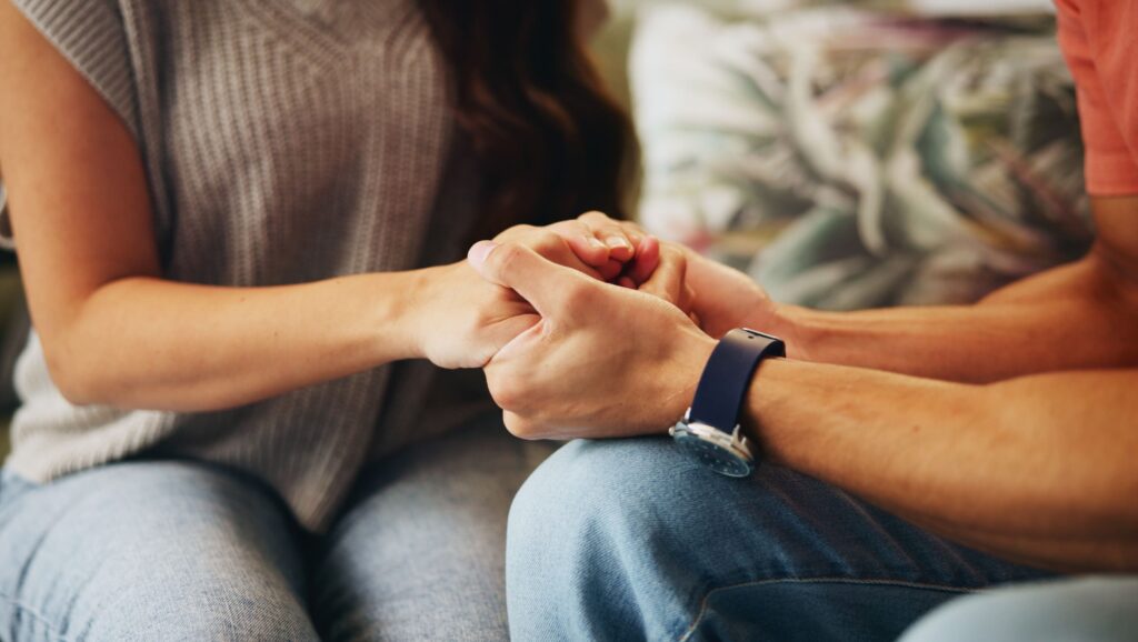 A man encourages his loved one to seek bipolar disorder treatment in Boulder, Colorado.