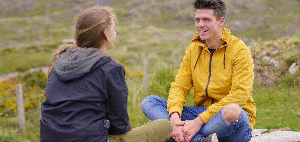 Man talking about what to expect from therapy during a conversation.