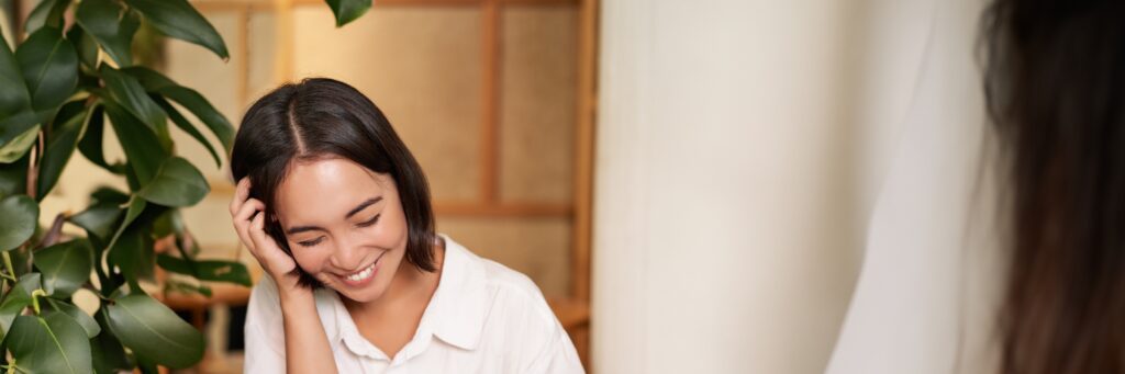 A woman enjoys personalized individual therapy during recovery treatment.
