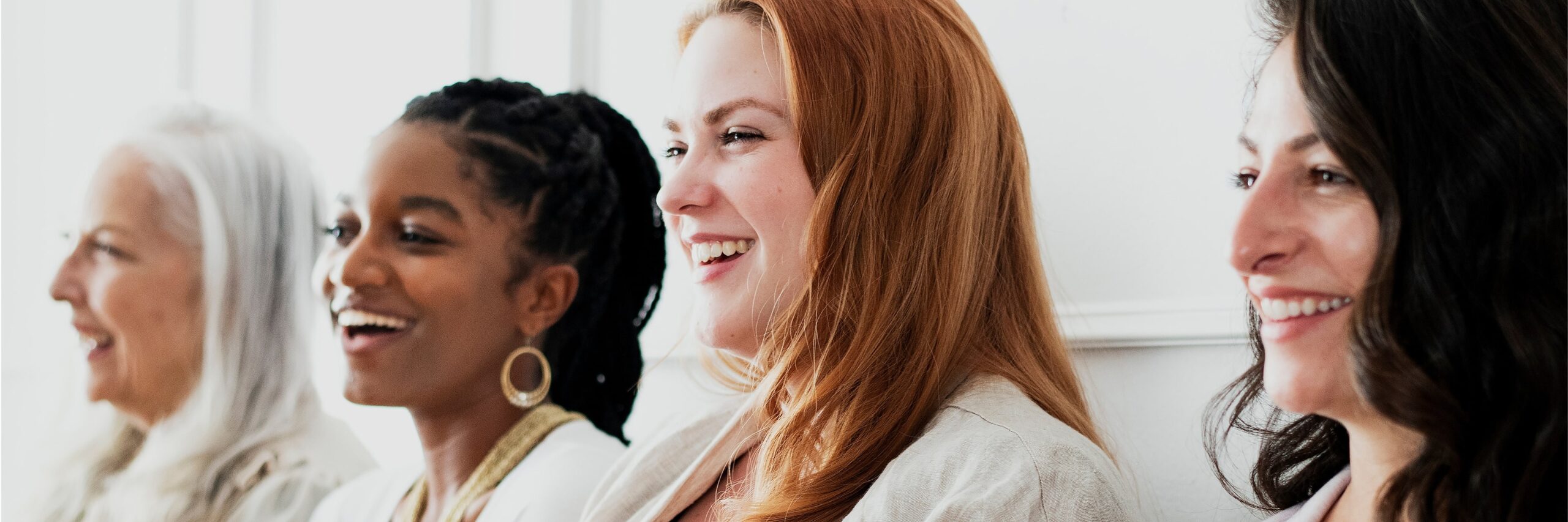 Women enjoy a group treatment exercise with a focus on women and addiction.