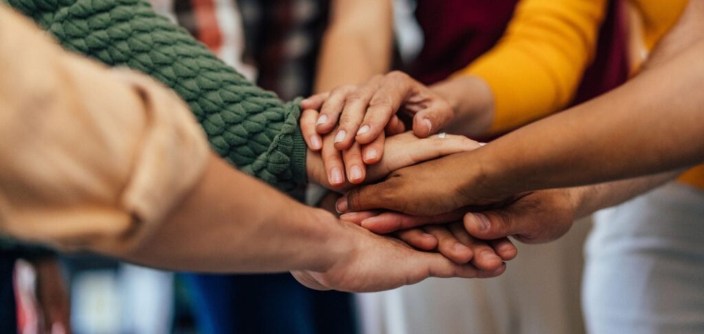 People connecting through addiction counseling in Denver.