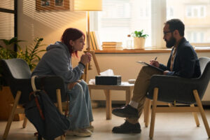 Patient speaking with counselor during oxycodone addiction treatment in Boulder CO session