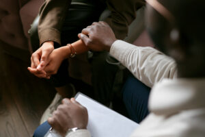 Person speaking with therapist during LGBTQI+ drug rehab in Boulder counseling session