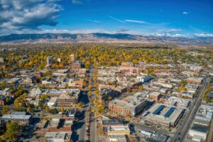 Aerial view of downtown Fort Collins in autumn representing access to rehab near Fort Collins, CO through Flatirons Recovery Center.