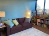 reading area with couch and bookshelves