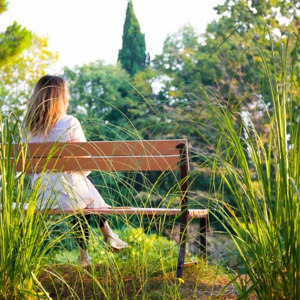 A woman contempletes cocaine addiction treatment in boulder.